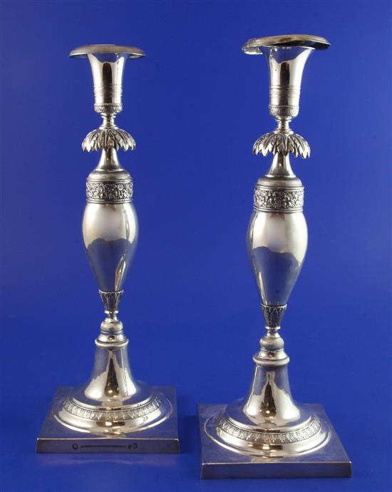 A pair of early 19th century German silver candlesticks, 23.5 oz.